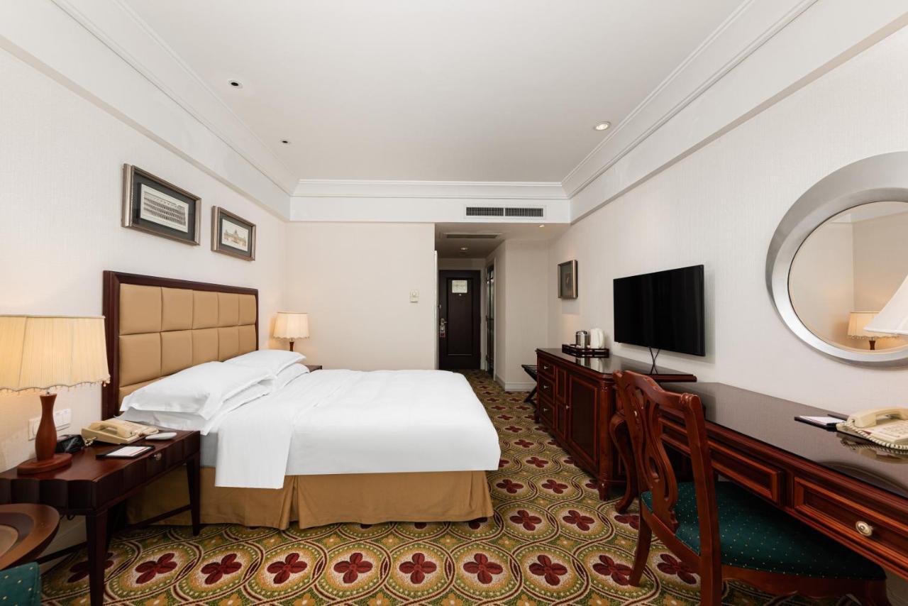 Ramada Plaza Optics Valley Hotel Ухань Экстерьер фото