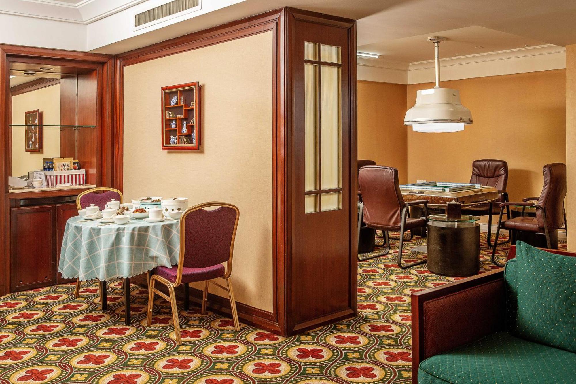 Ramada Plaza Optics Valley Hotel Ухань Экстерьер фото
