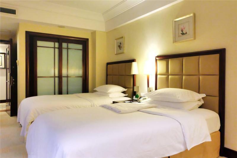 Ramada Plaza Optics Valley Hotel Ухань Экстерьер фото